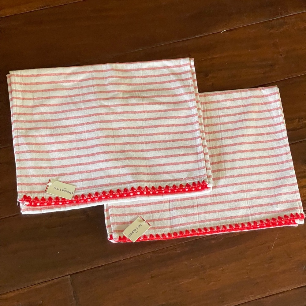 2 red striped table runners